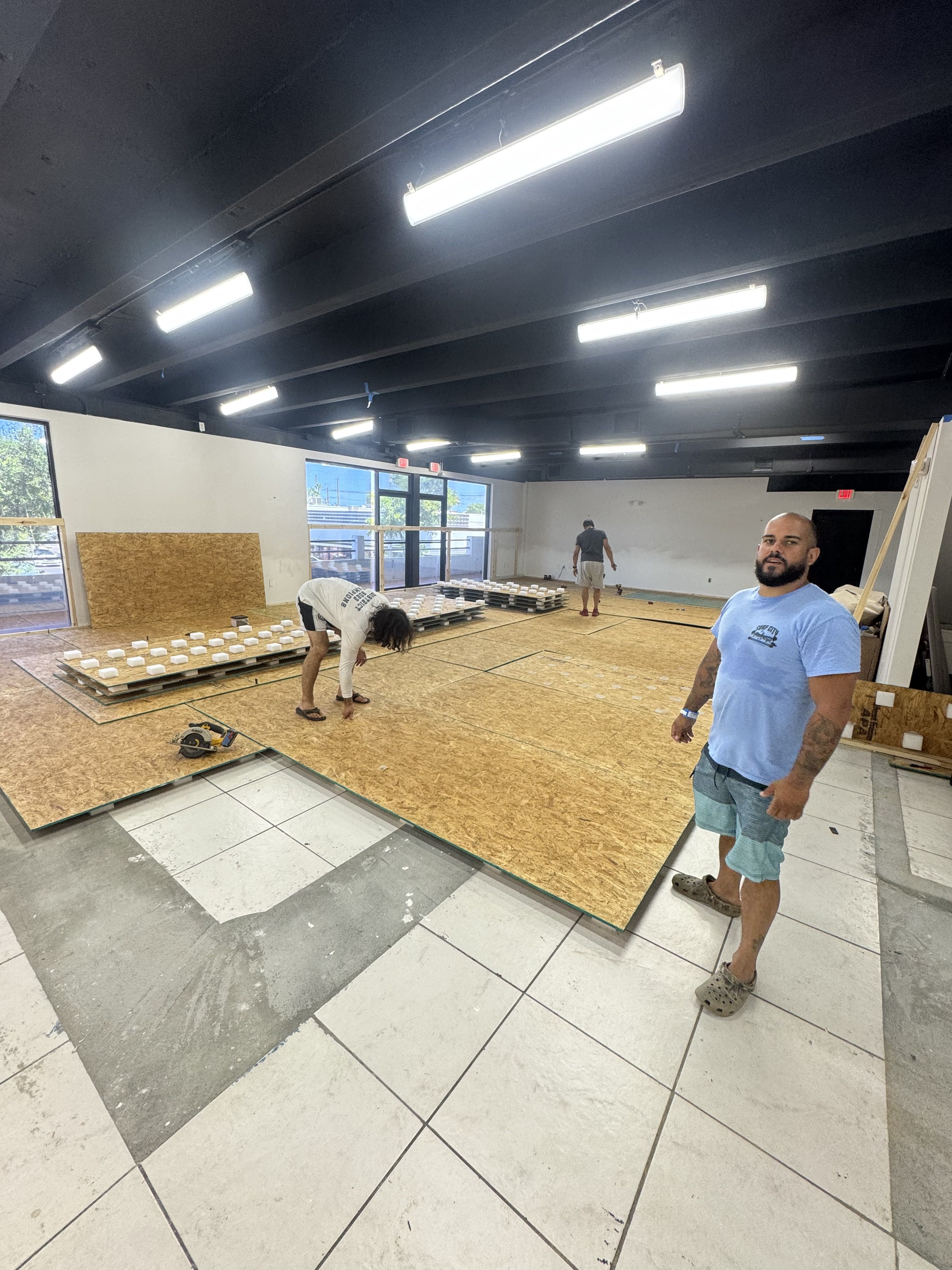 Floating subfloor installation at Ground Game Theory